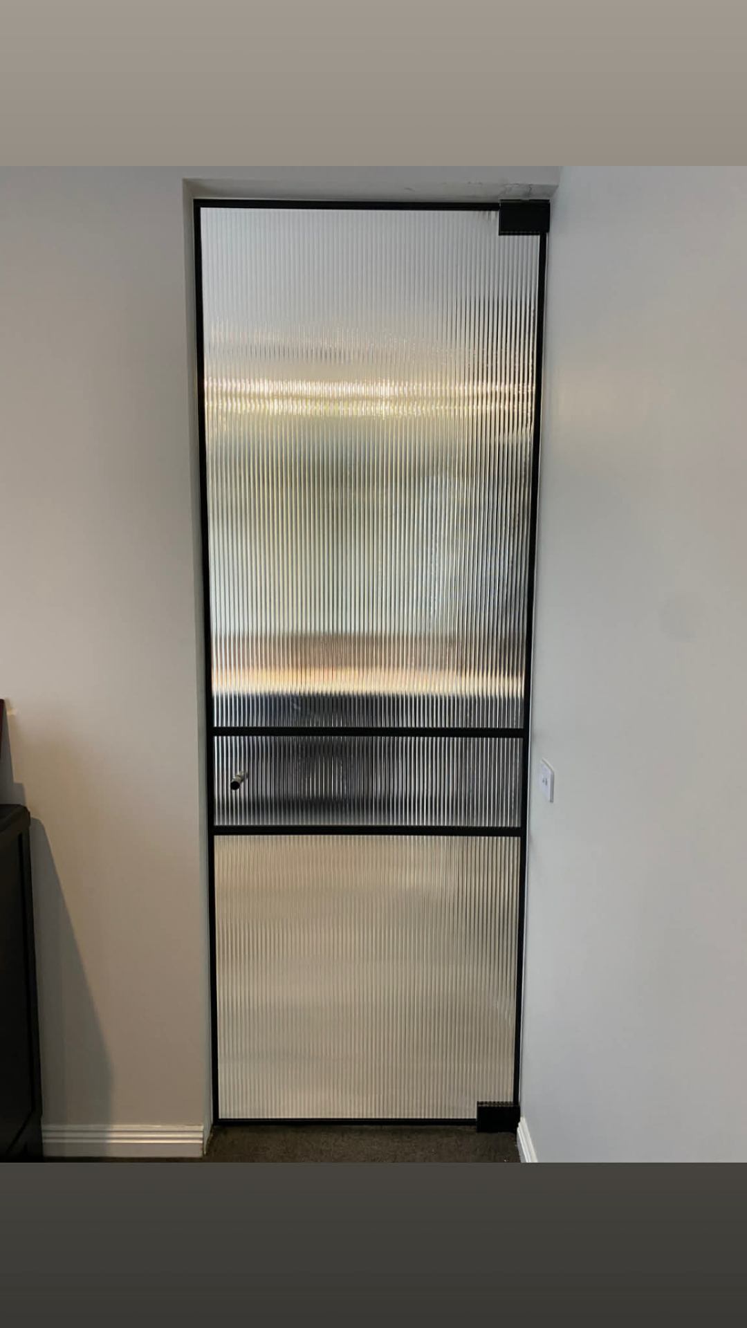Black framed fluted glass internal door