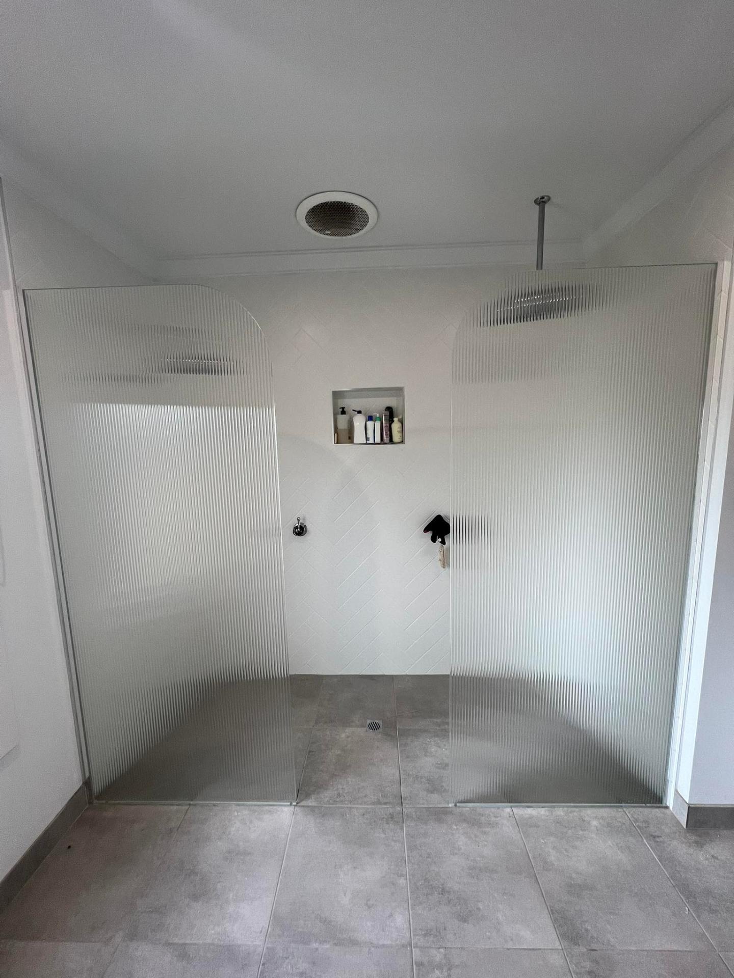 Fluted glass walk-in shower